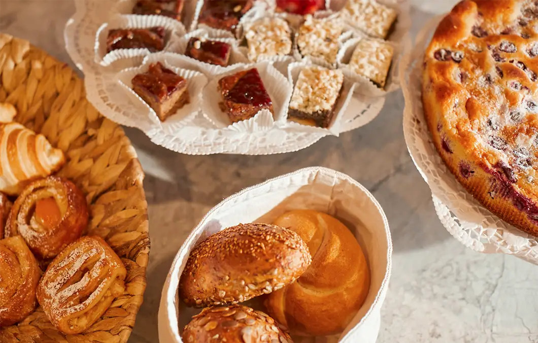 Breakfast with croissant, egg and cold cuts at Hotel Präsident München